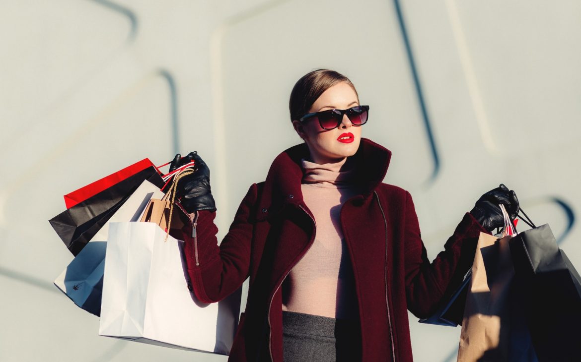 A haggler carrying shopping bags