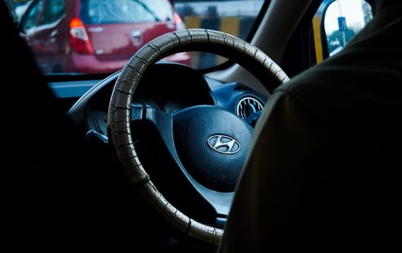 Picture of a car steering. 